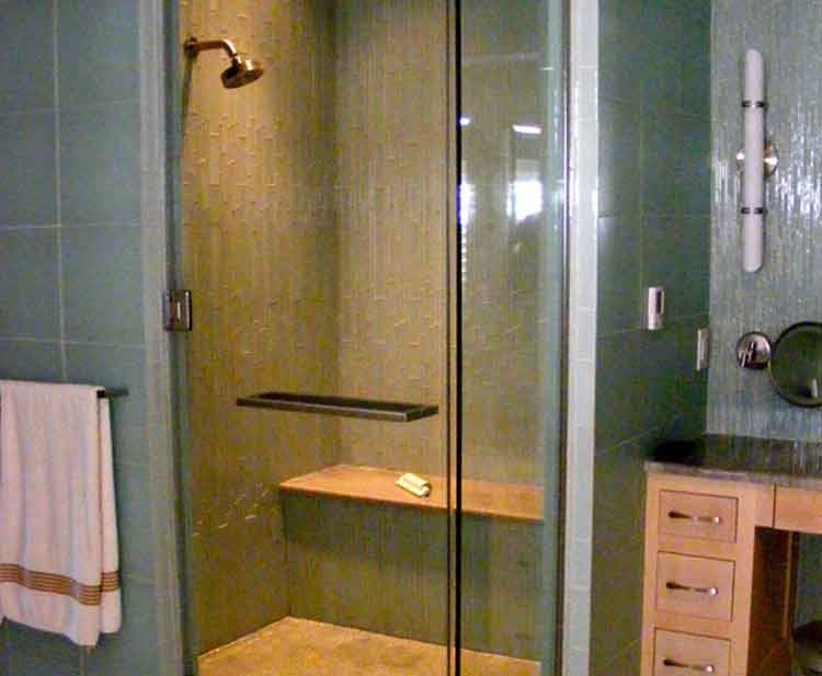 Bathroom shower with glass doors in a home in Virginia Beach built by Covington Contracting