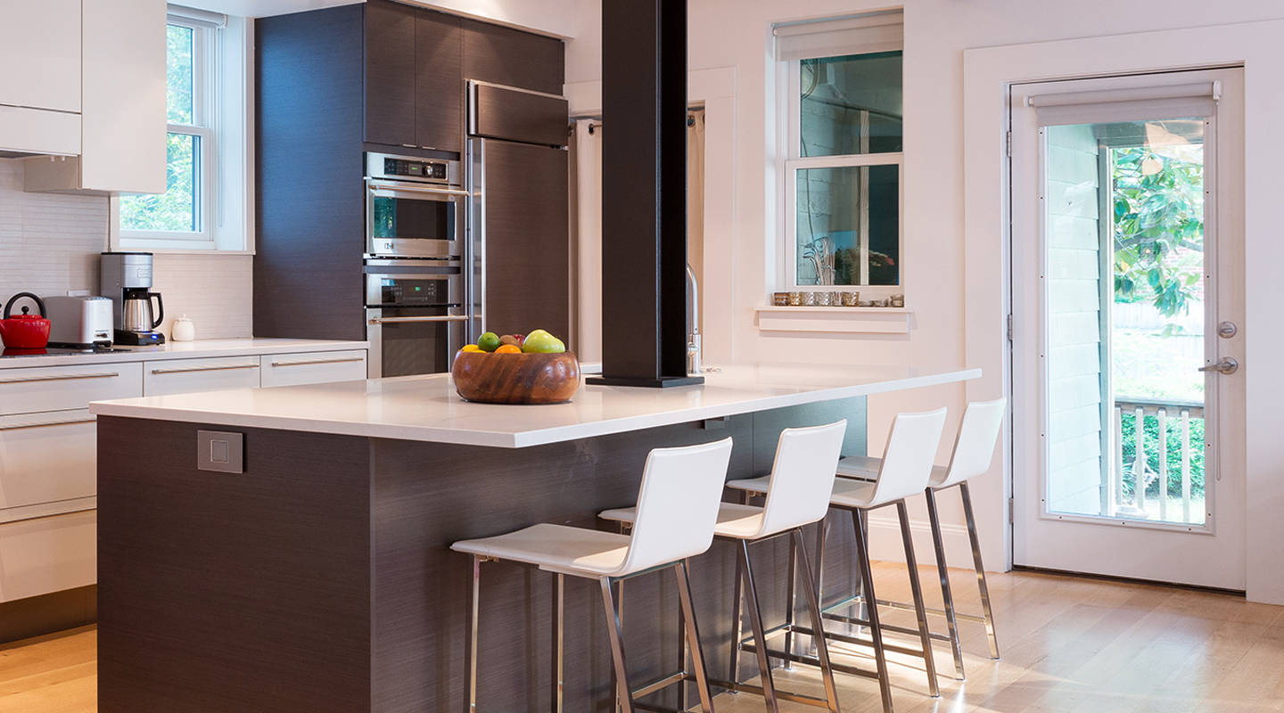 Covington Contracting's About Us page featuring a beautiful modern kitchen